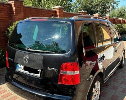 Черный Фольксваген Туран, объемом двигателя 0 л и пробегом 300 тыс. км за 6700 $, фото 1 на Automoto.ua