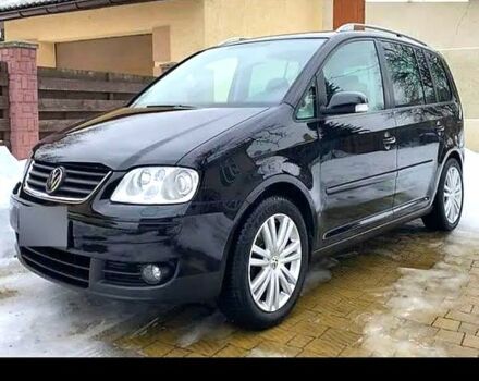 Черный Фольксваген Туран, объемом двигателя 2 л и пробегом 220 тыс. км за 7500 $, фото 3 на Automoto.ua