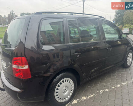 Черный Фольксваген Туран, объемом двигателя 1.9 л и пробегом 246 тыс. км за 7800 $, фото 3 на Automoto.ua