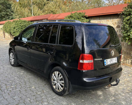 Черный Фольксваген Туран, объемом двигателя 2 л и пробегом 281 тыс. км за 5199 $, фото 3 на Automoto.ua