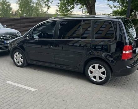 Черный Фольксваген Туран, объемом двигателя 1.97 л и пробегом 292 тыс. км за 6500 $, фото 1 на Automoto.ua