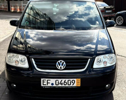 Черный Фольксваген Туран, объемом двигателя 1.6 л и пробегом 190 тыс. км за 6999 $, фото 78 на Automoto.ua