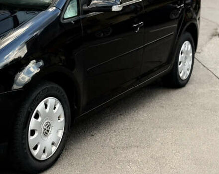 Черный Фольксваген Туран, объемом двигателя 1.6 л и пробегом 190 тыс. км за 6999 $, фото 47 на Automoto.ua