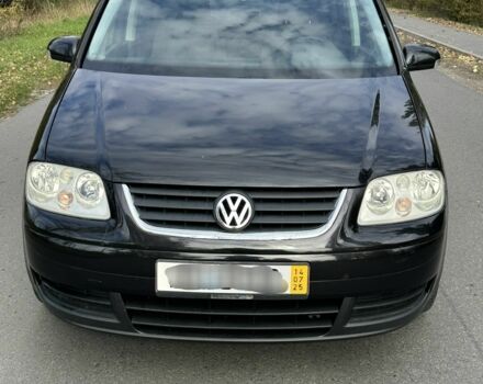 Черный Фольксваген Туран, объемом двигателя 1.9 л и пробегом 290 тыс. км за 3600 $, фото 4 на Automoto.ua
