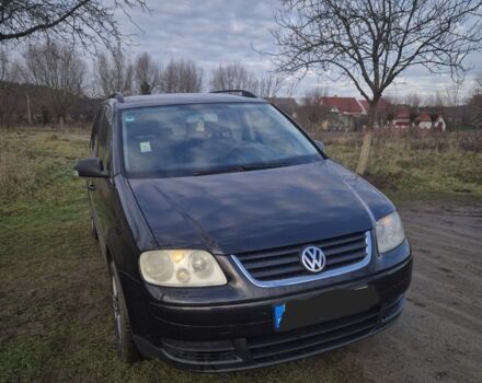 Черный Фольксваген Туран, объемом двигателя 1.9 л и пробегом 217 тыс. км за 2550 $, фото 1 на Automoto.ua