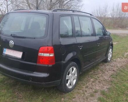 Черный Фольксваген Туран, объемом двигателя 1.6 л и пробегом 200 тыс. км за 5500 $, фото 8 на Automoto.ua