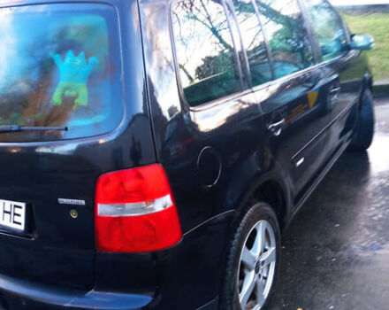 Черный Фольксваген Туран, объемом двигателя 2 л и пробегом 280 тыс. км за 5300 $, фото 2 на Automoto.ua