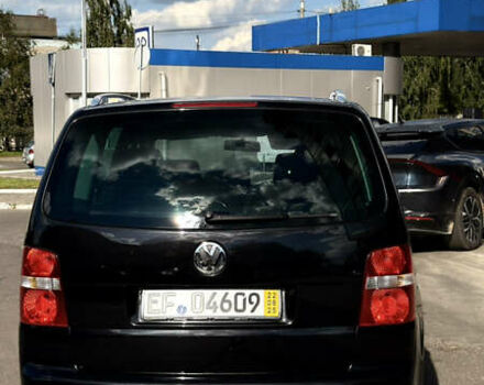 Черный Фольксваген Туран, объемом двигателя 1.6 л и пробегом 190 тыс. км за 6999 $, фото 79 на Automoto.ua