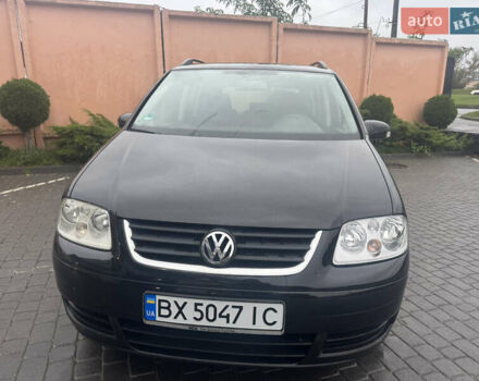 Черный Фольксваген Туран, объемом двигателя 1.9 л и пробегом 246 тыс. км за 7800 $, фото 1 на Automoto.ua