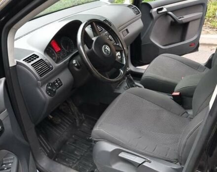 Черный Фольксваген Туран, объемом двигателя 1.39 л и пробегом 239 тыс. км за 5700 $, фото 6 на Automoto.ua