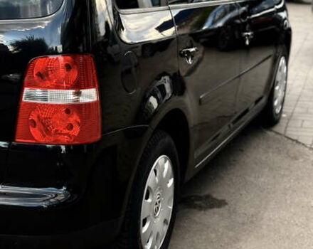 Черный Фольксваген Туран, объемом двигателя 1.6 л и пробегом 190 тыс. км за 6999 $, фото 58 на Automoto.ua