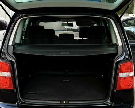 Черный Фольксваген Туран, объемом двигателя 1.6 л и пробегом 190 тыс. км за 6999 $, фото 33 на Automoto.ua