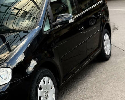Черный Фольксваген Туран, объемом двигателя 1.6 л и пробегом 190 тыс. км за 6999 $, фото 7 на Automoto.ua