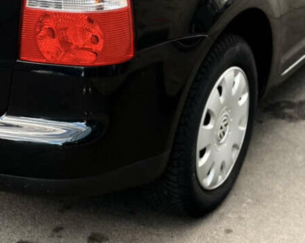 Черный Фольксваген Туран, объемом двигателя 1.6 л и пробегом 190 тыс. км за 6999 $, фото 61 на Automoto.ua