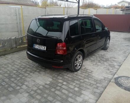 Черный Фольксваген Туран, объемом двигателя 1.4 л и пробегом 218 тыс. км за 6500 $, фото 4 на Automoto.ua