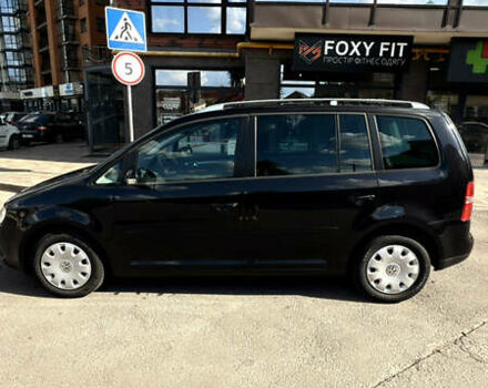 Черный Фольксваген Туран, объемом двигателя 1.6 л и пробегом 190 тыс. км за 6999 $, фото 69 на Automoto.ua