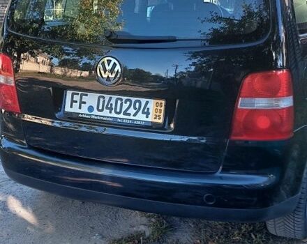 Черный Фольксваген Туран, объемом двигателя 1.6 л и пробегом 238 тыс. км за 5900 $, фото 8 на Automoto.ua