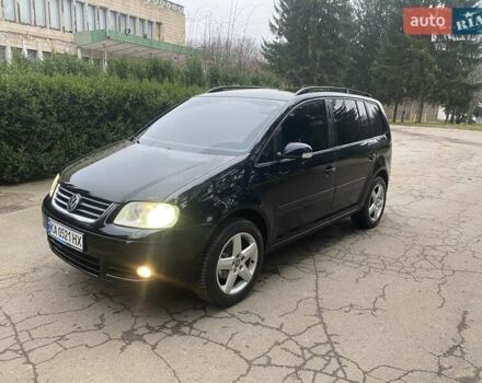 Чорний Фольксваген Туран, об'ємом двигуна 1.9 л та пробігом 390 тис. км за 6500 $, фото 1 на Automoto.ua