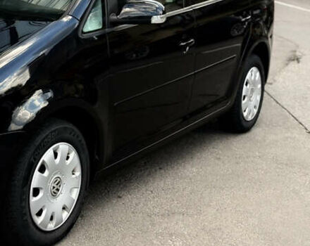 Черный Фольксваген Туран, объемом двигателя 1.6 л и пробегом 190 тыс. км за 6999 $, фото 44 на Automoto.ua