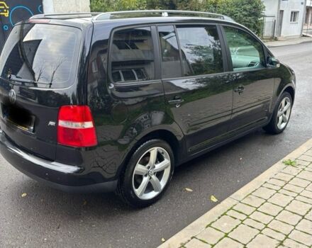 Чорний Фольксваген Туран, об'ємом двигуна 1.6 л та пробігом 207 тис. км за 7000 $, фото 3 на Automoto.ua