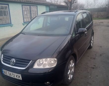 Черный Фольксваген Туран, объемом двигателя 1.6 л и пробегом 280 тыс. км за 5500 $, фото 1 на Automoto.ua