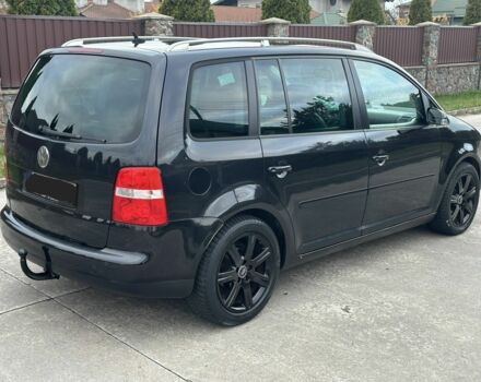 Черный Фольксваген Туран, объемом двигателя 2 л и пробегом 111 тыс. км за 4000 $, фото 3 на Automoto.ua