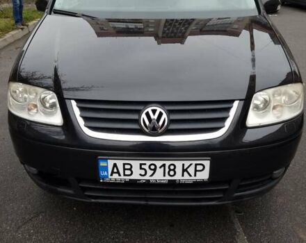 Черный Фольксваген Туран, объемом двигателя 1.39 л и пробегом 239 тыс. км за 5700 $, фото 4 на Automoto.ua