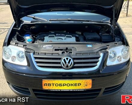 Черный Фольксваген Туран, объемом двигателя 1.4 л и пробегом 293 тыс. км за 3400 $, фото 8 на Automoto.ua