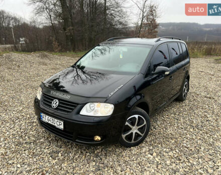 Черный Фольксваген Туран, объемом двигателя 1.9 л и пробегом 285 тыс. км за 6200 $, фото 2 на Automoto.ua