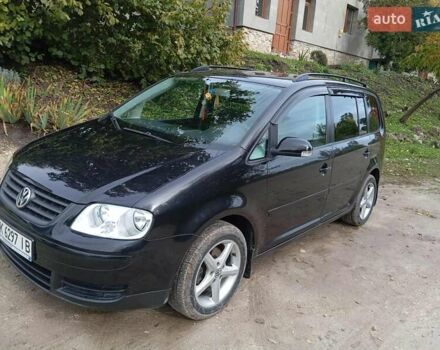 Черный Фольксваген Туран, объемом двигателя 1.6 л и пробегом 240 тыс. км за 5700 $, фото 6 на Automoto.ua