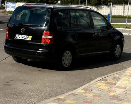 Черный Фольксваген Туран, объемом двигателя 1.6 л и пробегом 190 тыс. км за 6999 $, фото 76 на Automoto.ua