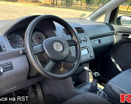 Черный Фольксваген Туран, объемом двигателя 1.4 л и пробегом 293 тыс. км за 3400 $, фото 4 на Automoto.ua