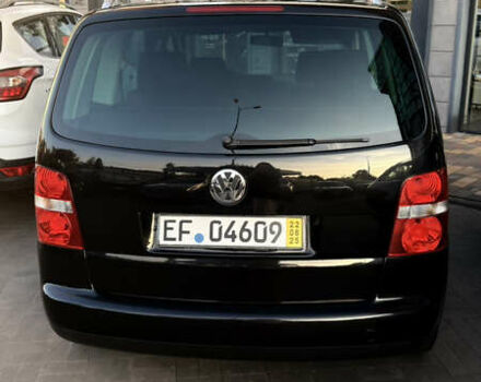 Черный Фольксваген Туран, объемом двигателя 1.6 л и пробегом 190 тыс. км за 6999 $, фото 19 на Automoto.ua