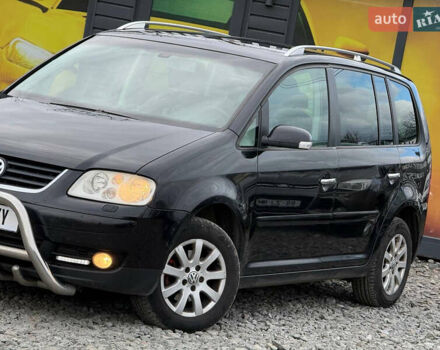 Черный Фольксваген Туран, объемом двигателя 2 л и пробегом 350 тыс. км за 5900 $, фото 6 на Automoto.ua