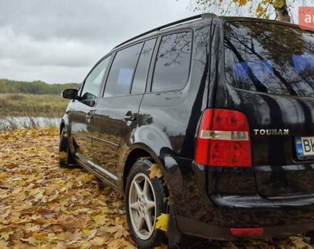 Черный Фольксваген Туран, объемом двигателя 1.39 л и пробегом 278 тыс. км за 5200 $, фото 6 на Automoto.ua