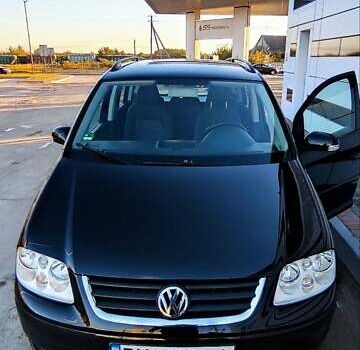 Черный Фольксваген Туран, объемом двигателя 1.6 л и пробегом 197 тыс. км за 5850 $, фото 2 на Automoto.ua