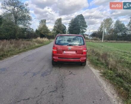 Черный Фольксваген Туран, объемом двигателя 1.6 л и пробегом 261 тыс. км за 4999 $, фото 29 на Automoto.ua