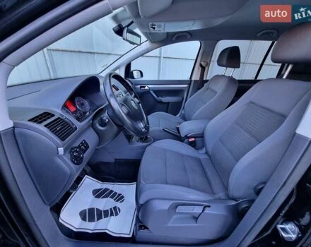 Черный Фольксваген Туран, объемом двигателя 1.4 л и пробегом 193 тыс. км за 7300 $, фото 3 на Automoto.ua