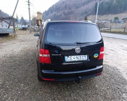 Черный Фольксваген Туран, объемом двигателя 2 л и пробегом 320 тыс. км за 6800 $, фото 4 на Automoto.ua