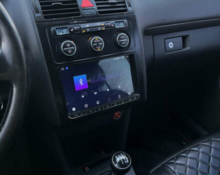 Черный Фольксваген Туран, объемом двигателя 1.9 л и пробегом 315 тыс. км за 6900 $, фото 25 на Automoto.ua