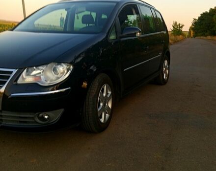 Чорний Фольксваген Туран, об'ємом двигуна 1.4 л та пробігом 207 тис. км за 7200 $, фото 2 на Automoto.ua