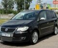 Чорний Фольксваген Туран, об'ємом двигуна 1.4 л та пробігом 250 тис. км за 5350 $, фото 1 на Automoto.ua