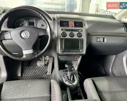 Чорний Фольксваген Туран, об'ємом двигуна 1.97 л та пробігом 313 тис. км за 7500 $, фото 3 на Automoto.ua