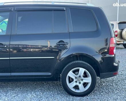 Черный Фольксваген Туран, объемом двигателя 2 л и пробегом 260 тыс. км за 7890 $, фото 4 на Automoto.ua