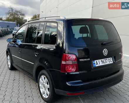 Черный Фольксваген Туран, объемом двигателя 1.39 л и пробегом 250 тыс. км за 6000 $, фото 4 на Automoto.ua
