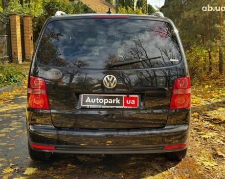 Фольксваген Туран 2007 в Киеве на Automoto.ua Черный Фольксваген Туран, объемом двигателя 1.4 л и пробегом 242 тыс. км за 6390 $, фото 7 на Automoto.ua