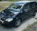 Чорний Фольксваген Туран, об'ємом двигуна 2 л та пробігом 293 тис. км за 4016 $, фото 1 на Automoto.ua