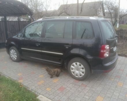 Чорний Фольксваген Туран, об'ємом двигуна 1.4 л та пробігом 268 тис. км за 5600 $, фото 1 на Automoto.ua