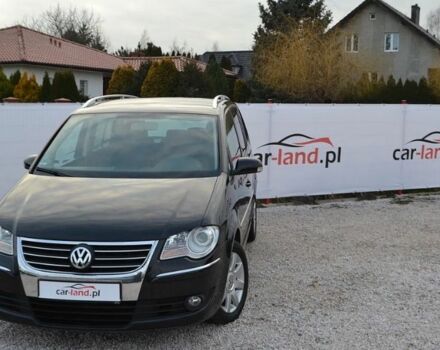 Черный Фольксваген Туран, объемом двигателя 2 л и пробегом 216 тыс. км за 5399 $, фото 2 на Automoto.ua