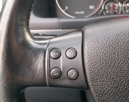 Чорний Фольксваген Туран, об'ємом двигуна 2 л та пробігом 260 тис. км за 9390 $, фото 26 на Automoto.ua